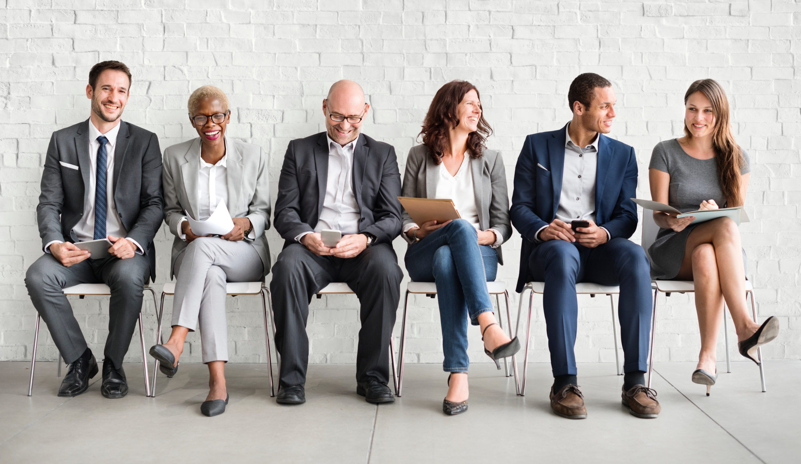 Group of diverse people are waiting for a job interview